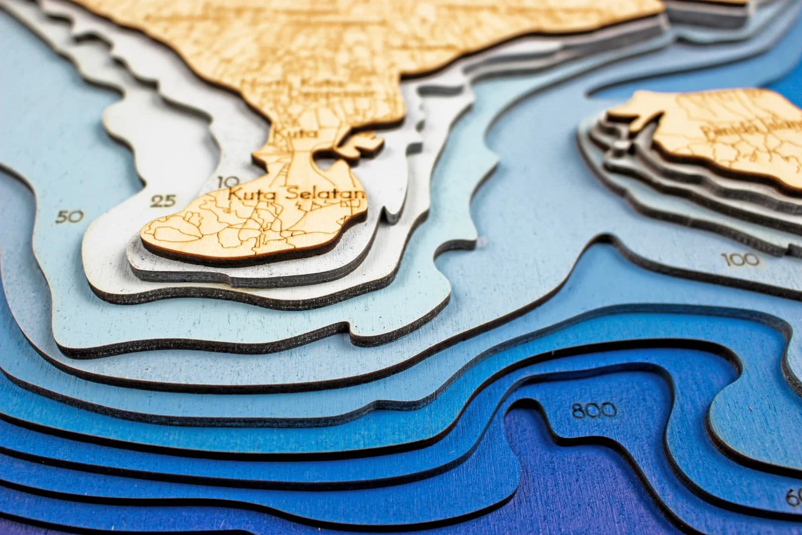 sea-maps_bali-nautical-3d--wooden-depth-map---12-layer-laser-cut-art-piece__s1wmguupcu8.webp