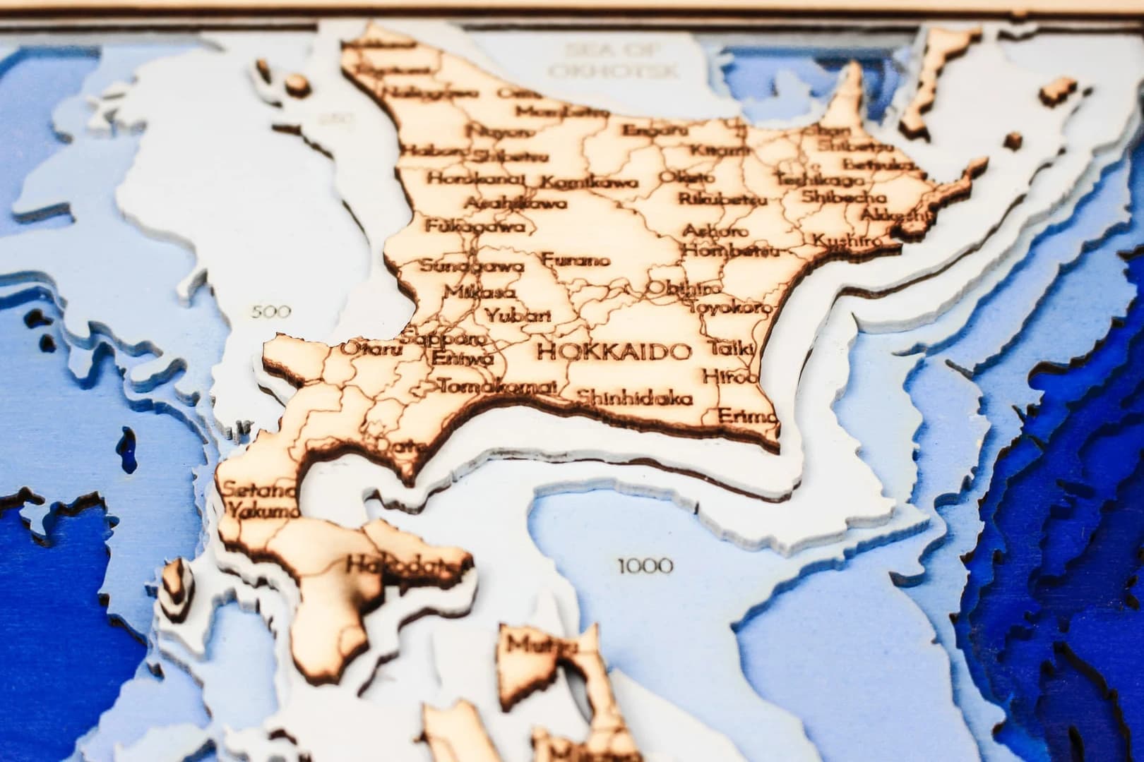 sea-maps_japan-corfu-nautical-3d-wooden-depth-map__ljsw7dwa9t.webp